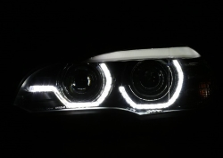 Тюнинговая передняя оптика для BMW E70 с 2006 по 2010 г.в. Черная, под штатный ксенон. Для моделей с AFS